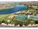 Community park with lake, tennis courts, and basketball court at 9233 S Krista E Dr, Goodyear, AZ 85338