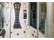 Modern walk-in shower with multiple shower heads at 9233 S Krista E Dr, Goodyear, AZ 85338