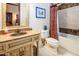 Elegant bathroom with a soaking tub, shower, and modern vanity at 9233 S Krista E Dr, Goodyear, AZ 85338