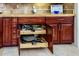 Well-organized kitchen drawers with pots, pans, and lids at 9233 S Krista E Dr, Goodyear, AZ 85338