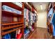 Large walk-in closet with ample shelving and hanging space at 9233 S Krista E Dr, Goodyear, AZ 85338