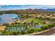 Community park with lake, tennis courts, and basketball court at 9233 S Krista E Dr, Goodyear, AZ 85338