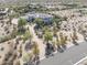 Home with solar panels and desert landscaping at 9233 S Krista E Dr, Goodyear, AZ 85338