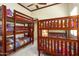 Bedroom with twin bunk beds and additional sleeping space at 9233 S Krista E Dr, Goodyear, AZ 85338