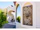 Ornate exterior wall detail with metal art at 9233 S Krista E Dr, Goodyear, AZ 85338