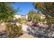Stunning home exterior with desert landscaping at 9233 S Krista E Dr, Goodyear, AZ 85338