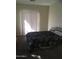 Bright bedroom with sliding glass door and comfortable bed at 15667 N 29Th St, Phoenix, AZ 85032