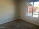 Bedroom with window overlooking the garden at 4327 E San Gabriel Ave, Phoenix, AZ 85044