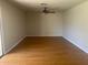 Spacious living room featuring hardwood floors and ceiling fan at 4327 E San Gabriel Ave, Phoenix, AZ 85044