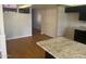Bright dining area with hardwood floors and kitchen access at 4327 E San Gabriel Ave, Phoenix, AZ 85044