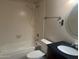 Clean bathroom with tub, shower, and dark vanity at 4327 E San Gabriel Ave, Phoenix, AZ 85044