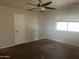 Well-lit bedroom with ceiling fan and closet at 4327 E San Gabriel Ave, Phoenix, AZ 85044