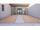 Inviting entryway with a private courtyard and modern front door at 25564 N 119Th St, Scottsdale, AZ 85255