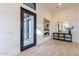 Light and bright entryway with modern console table and artwork at 25564 N 119Th St, Scottsdale, AZ 85255