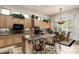 Spacious kitchen with light wood cabinets and granite countertops at 6545 N 29Th St, Phoenix, AZ 85016