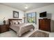 Comfortable bedroom with mountain views and rich wood furnishings at 6545 N 29Th St, Phoenix, AZ 85016