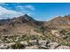 Aerial view of luxury homes nestled in a mountain community at 6545 N 29Th St, Phoenix, AZ 85016