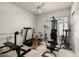 Home gym with various exercise equipment including treadmill and weight bench at 6545 N 29Th St, Phoenix, AZ 85016