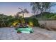 Private pool with a waterfall feature and mountain backdrop at 6545 N 29Th St, Phoenix, AZ 85016
