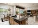 Kitchen with island, breakfast bar and open view to Gathering room at 6545 N 29Th St, Phoenix, AZ 85016