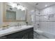 Clean bathroom with white tile, bathtub, and updated vanity at 7344 E Keim Dr, Scottsdale, AZ 85250