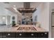 Modern kitchen with granite countertops and stainless steel appliances at 7344 E Keim Dr, Scottsdale, AZ 85250