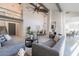 Spacious living room with high ceilings, exposed beams, and a modern aesthetic at 7344 E Keim Dr, Scottsdale, AZ 85250