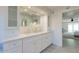 Double vanity bathroom with modern fixtures and ample storage at 7344 E Keim Dr, Scottsdale, AZ 85250