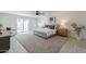 Spacious main bedroom with plush carpeting and access to backyard at 7344 E Keim Dr, Scottsdale, AZ 85250