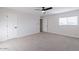 Spacious bedroom with ceiling fan and plenty of natural light at 7344 E Keim Dr, Scottsdale, AZ 85250