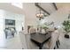 Bright dining room with a chandelier and stylish furnishings at 7344 E Keim Dr, Scottsdale, AZ 85250