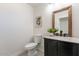 Stylish bathroom with granite vanity and updated fixtures at 7344 E Keim Dr, Scottsdale, AZ 85250