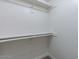 Well-designed closet with a double hanging rod and shelving at 7344 E Keim Dr, Scottsdale, AZ 85250
