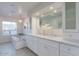 Elegant bathroom with double vanity and a large mirror at 7344 E Keim Dr, Scottsdale, AZ 85250