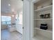 Luxurious bathroom with soaking tub, separate shower, and linen closet at 7344 E Keim Dr, Scottsdale, AZ 85250