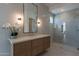 Modern bathroom with a walk-in shower and floating vanity at 4723 E Desert Park Pl, Paradise Valley, AZ 85253