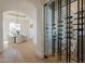 Glass-enclosed wine cellar with ample storage space at 4723 E Desert Park Pl, Paradise Valley, AZ 85253