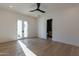 Light-filled bedroom with French doors leading to patio at 4723 E Desert Park Pl, Paradise Valley, AZ 85253