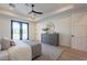 Main bedroom with light hardwood floors and plenty of natural light at 4723 E Desert Park Pl, Paradise Valley, AZ 85253