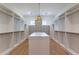 Spacious walk-in closet with ample shelving and hanging space at 4723 E Desert Park Pl, Paradise Valley, AZ 85253