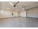 Bright and modern garage with ample space for parking and storage at 4723 E Desert Park Pl, Paradise Valley, AZ 85253