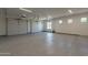 Clean and spacious garage with high ceilings and overhead storage at 4723 E Desert Park Pl, Paradise Valley, AZ 85253