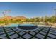 Resort-style pool and spa with mountain backdrop at 4723 E Desert Park Pl, Paradise Valley, AZ 85253