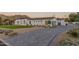 Elegant home with a curved driveway and mountain views at 4723 E Desert Park Pl, Paradise Valley, AZ 85253
