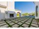 Outdoor fireplace and patio area with mountain views at 4723 E Desert Park Pl, Paradise Valley, AZ 85253