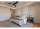 Bright bedroom with hardwood floors and en-suite bathroom access at 4723 E Desert Park Pl, Paradise Valley, AZ 85253