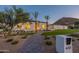 Stunning home exterior with a beautifully landscaped yard at 4723 E Desert Park Pl, Paradise Valley, AZ 85253