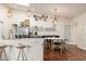 Eat-in kitchen with ample counter space, a round dining table, and terracotta tile floors at 9020 N 33Rd Way, Phoenix, AZ 85028