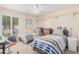 Bedroom with two twin beds, ample closet space, and neutral color scheme at 9020 N 33Rd Way, Phoenix, AZ 85028