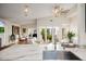 Modern kitchen with a large island, stainless steel sink, and marble countertops at 9020 N 33Rd Way, Phoenix, AZ 85028